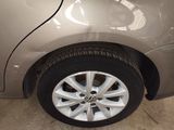 a close up of a car ' s tire on the ground