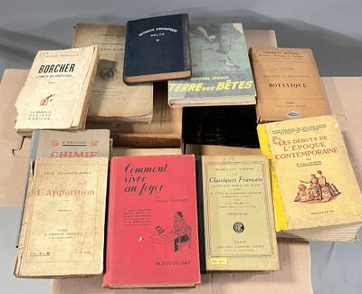 a lot of books that are sitting on a table