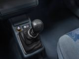 a close up view of a car ' s gear lever and gear shift
