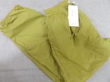 the pants are green and have a tag on them