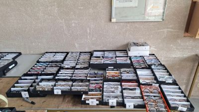 a table that has a lot of cds on top of it