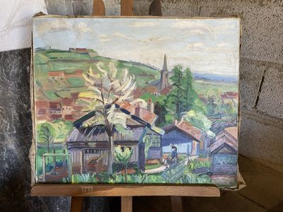 une peinture à l'huile représentant un moulin à vent posé sur un chevalet devant un mur de pierre
