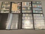 a lot of different stamps on a table together