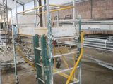 a picture of a scaffold in a building with a lot of scaffolding around it