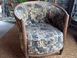 a chair that is sitting in the middle of a room