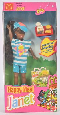 Poupée « Happy Meal » représentant une petite fille afro-américaine, dans sa boîte d'origine