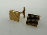 gold plated square cufflinks with black squares on them
