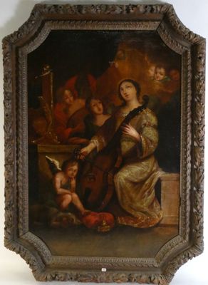 un vieux tableau représentant une femme tenant un bébé dans une pièce