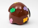 a chocolate egg shaped like a ladybug with flowers on it