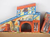 a cardboard model of a train station in a cardboard box