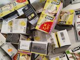 a pile of cigarettes and cigarettes on a table