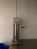 Un poussoir en inox COLA manuel
