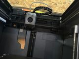 a small black box with a laptop inside of it