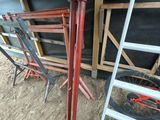 a ladder leaning up against a wall next to a ladder