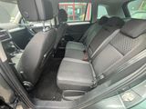 the back seats of a car are empty and the passenger seat is empty