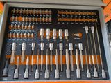 many tools in a box that are sitting on a table