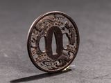 a close up of a small metal object on a table