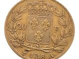 Gros plan sur une pièce d'or ornée d'une couronne