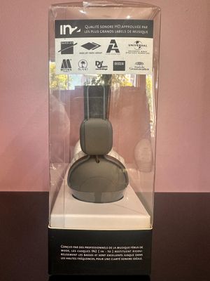 a box with a pair of headphones inside of it
