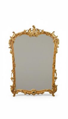 une image d'un miroir encadré d'or sur un fond blanc
