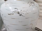 two vases that are sitting on a table