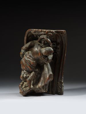 une image représentant une sculpture en bois d'un homme tenant un enfant dans ses bras