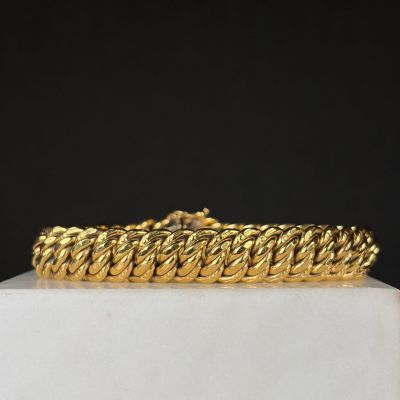 Bracelet maille gourmette en or jaune 18K (750°/00), fermoir anneau ressort avec chainette de