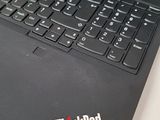 the back of a laptop with the thinkpad logo on it