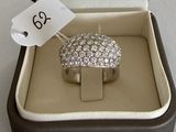 a ring in a box with a price tag on it
