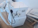a machine that is sitting on the floor in a room
