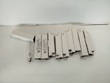 a lot of white boxes that are sitting on a table