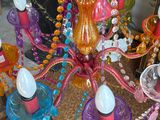 a multi colored chandelier that is sitting on the floor