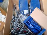 a cardboard box filled with assorted electrical equipment
