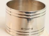 a silver cup that is sitting on top of a table