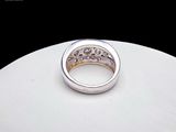 a picture of a wedding ring on a white plate