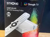 a box that has a remote in it on a table