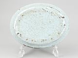 an image of a white plate with a cracky design on it