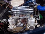 a close up of a small engine in a car