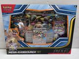 the box is open to show the contents of the pokemon card game