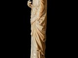 an image of a statue of a woman holding a cup