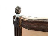 a picture of a bed with a wooden headboard and foot board