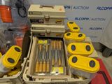 many different types of tools sitting on a table