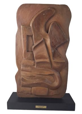 statue of a man with a hammer and a hammer in his hand