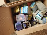 a cardboard box filled with various items that are in it