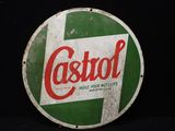 un panneau vert et blanc sur lequel est inscrit « Castrool »
