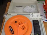 a plastic tray with an orange object on top of it