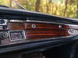a dashboard of a car with a clock on it