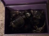 a purple box with a bunch of bottles inside of it