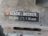 a close up of a black and decker sign on a machine