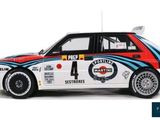 the car is white and blue and red with a number 4 on the side
